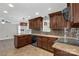 Bright kitchen with pendant lighting, granite countertops, and tile backsplash at 4604 Karwood Dr, Rock Hill, SC 29732
