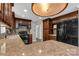 Modern kitchen features granite countertops, ample cabinetry, and black appliances at 4604 Karwood Dr, Rock Hill, SC 29732