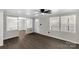 Bright living room with wood-look floors, neutral paint, and plenty of natural light at 4604 Karwood Dr, Rock Hill, SC 29732