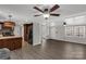 Open-concept living room featuring wood-look floors and an adjacent updated kitchen at 4604 Karwood Dr, Rock Hill, SC 29732