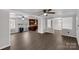 Open-concept living room featuring wood-look floors and an adjacent updated kitchen at 4604 Karwood Dr, Rock Hill, SC 29732
