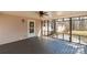 Inviting screened-in porch with a view of the backyard and surrounding greenery at 4604 Karwood Dr, Rock Hill, SC 29732