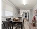 Inviting dining area with natural light, great for Gathering meals or entertaining guests at 468 Wilhelm Ne Pl, Concord, NC 28025