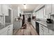 Well-equipped kitchen with granite counters, ample cabinet space, and modern appliances at 468 Wilhelm Ne Pl, Concord, NC 28025