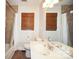This bathroom features a shower and tub combination with a window at 4824 Harcourt Ln, Charlotte, NC 28212