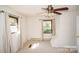 This is a bright bedroom with neutral walls and carpet at 4824 Harcourt Ln, Charlotte, NC 28212