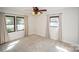 This light and airy bedroom has neutral walls, carpet, and curtains at 4824 Harcourt Ln, Charlotte, NC 28212