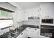 Modern kitchen with stainless steel appliances, granite countertops and subway tile backsplash at 4824 Harcourt Ln, Charlotte, NC 28212