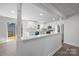 Open kitchen with stainless steel appliances and white subway tile backsplash at 5015 Forestmont Dr, Matthews, NC 28105