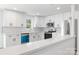 Modern kitchen features stainless appliances, quartz countertops, and subway tile at 5015 Forestmont Dr, Matthews, NC 28105