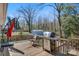 Deck with outdoor grill and privacy fence overlooking backyard at 5230 Northview Dr, Hickory, NC 28601