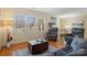 Comfortable living room with hardwood floors, natural light, and relaxed seating arrangements at 5230 Northview Dr, Hickory, NC 28601