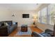 Inviting living room with hardwood floors, a mounted TV, and stylish decor, perfect for relaxation at 5230 Northview Dr, Hickory, NC 28601