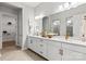 Bright bathroom featuring dual vanity, quartz countertop, modern fixtures, and ample storage at 5312 Allburn Pkwy, Concord, NC 28027