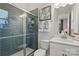 Modern bathroom featuring a tiled shower, vanity with sink, and neutral decor at 5312 Allburn Pkwy, Concord, NC 28027