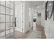 Bright hallway features hardwood floors and leads to a staircase at 5312 Allburn Pkwy, Concord, NC 28027