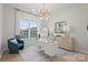 Bright office features a large window, modern desk, and elegant decor at 5312 Allburn Pkwy, Concord, NC 28027