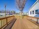 A spacious back deck with wooden railings offers a perfect place for outdoor relaxation at 5985 Bertie Ave, Salisbury, NC 28147