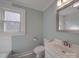Light and airy bathroom with a neutral color palette, a sleek sink, and great lighting at 5985 Bertie Ave, Salisbury, NC 28147
