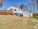 View of a detached garage in the backyard, providing extra storage and parking at 5985 Bertie Ave, Salisbury, NC 28147