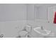 Powder room featuring beadboard walls, white fixtures, and a decorative mirror at 603 Smokehouse Ln, Albemarle, NC 28001