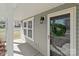 Inviting front entrance featuring a glass-paneled door with a wreath and adjacent window at 603 Smokehouse Ln, Albemarle, NC 28001