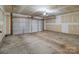 Spacious two car garage providing ample space for vehicles and storage at 603 Smokehouse Ln, Albemarle, NC 28001