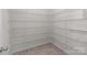 Walk-in pantry featuring wire shelving and tile flooring for organized storage at 603 Smokehouse Ln, Albemarle, NC 28001