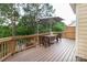 Relaxing back deck with an umbrella table set perfect for outdoor dining at 609 Sunfish Ln, Tega Cay, SC 29708