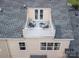 Aerial view of home featuring rooftop balcony with patio furniture at 609 Sunfish Ln, Tega Cay, SC 29708