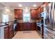 Kitchen with stainless steel appliances, granite countertops, and ample cabinetry at 609 Sunfish Ln, Tega Cay, SC 29708