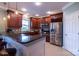 Modern kitchen featuring granite countertops, stainless steel appliances, and center island with seating at 609 Sunfish Ln, Tega Cay, SC 29708