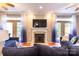 Inviting living room featuring a cozy fireplace and french doors to the exterior at 609 Sunfish Ln, Tega Cay, SC 29708