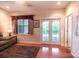 Cozy living room with hardwood floors, and french doors at 609 Sunfish Ln, Tega Cay, SC 29708