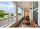 Relaxing covered front porch perfect for enjoying the outdoors with peaceful neighborhood views at 609 Sunfish Ln, Tega Cay, SC 29708