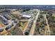 Expansive aerial view showcasing the neighborhood's layout, with ponds and convenient shopping areas at 619 R L Stowe Rd, Belmont, NC 28012