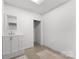Unfinished basement bathroom featuring a vanity with storage at 619 R L Stowe Rd, Belmont, NC 28012
