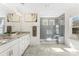 Modern bathroom with double vanity, granite countertops, and glass enclosed shower with built in bench at 619 R L Stowe Rd, Belmont, NC 28012