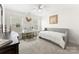 Comfortable bedroom with a vanity, upholstered daybed, and neutral decor at 619 R L Stowe Rd, Belmont, NC 28012