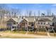 Charming curb appeal of these two-story homes, with manicured lawns and wrought iron fences at 619 R L Stowe Rd, Belmont, NC 28012