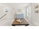 Stylishly designed hallway featuring a decorative cabinet, modern decor, and natural light at 619 R L Stowe Rd, Belmont, NC 28012