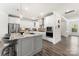 Modern kitchen with stainless steel appliances, granite island, and pendant lighting at 619 R L Stowe Rd, Belmont, NC 28012