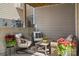 Cozy outdoor patio featuring comfortable seating and charming decor, perfect for relaxation at 619 R L Stowe Rd, Belmont, NC 28012
