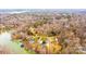 Beautiful aerial view of lakefront homes nestled among lush trees and foliage at 651 25Th Nw Ave, Hickory, NC 28601