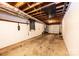Unfinished basement with exposed rafters and concrete floor at 651 25Th Nw Ave, Hickory, NC 28601