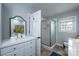 Bathroom featuring a glass enclosed shower, toilet, sink, and vanity at 651 25Th Nw Ave, Hickory, NC 28601