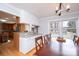 Bright eat-in kitchen features granite countertops, white cabinetry, and stainless appliances at 651 25Th Nw Ave, Hickory, NC 28601