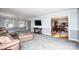 Open living room with carpeted floors and a view of the dining area and kitchen at 651 25Th Nw Ave, Hickory, NC 28601