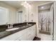 Bathroom with a double vanity, granite countertops, and a shower with a decorative curtain at 670 Belle Grove Dr, Clover, SC 29710