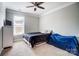 Neutral bedroom with carpet and a window, small TV on the dresser at 670 Belle Grove Dr, Clover, SC 29710